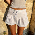 Jenesis Lace Bow Mini Skirt