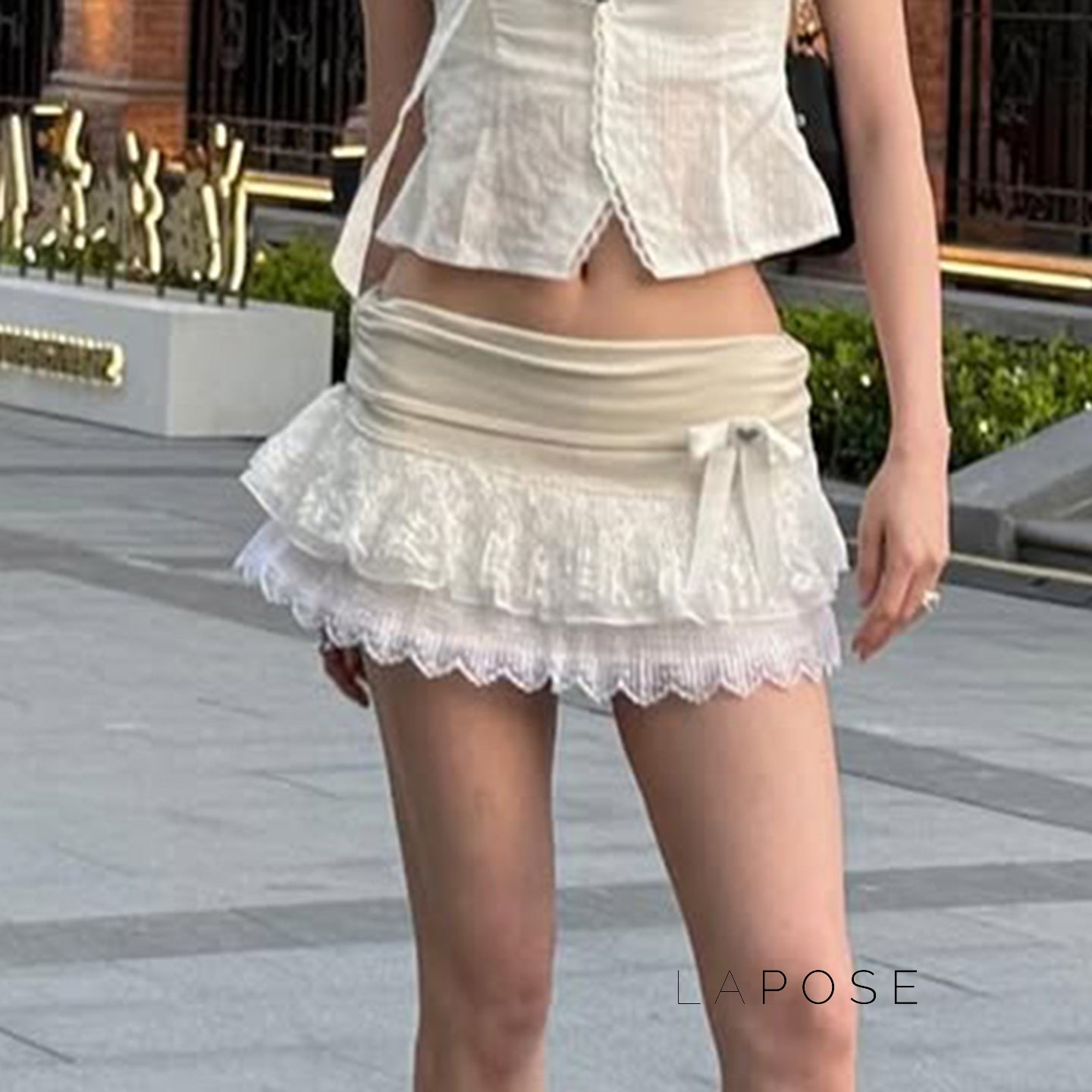 Leylani Bow Tiered Mini Skirt