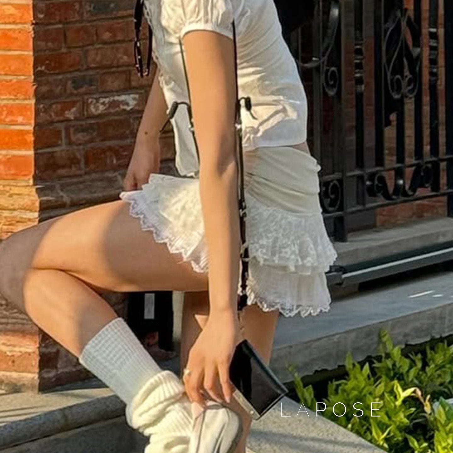 Leylani Bow Tiered Mini Skirt