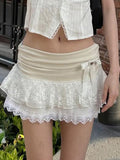 Leylani Bow Tiered Mini Skirt