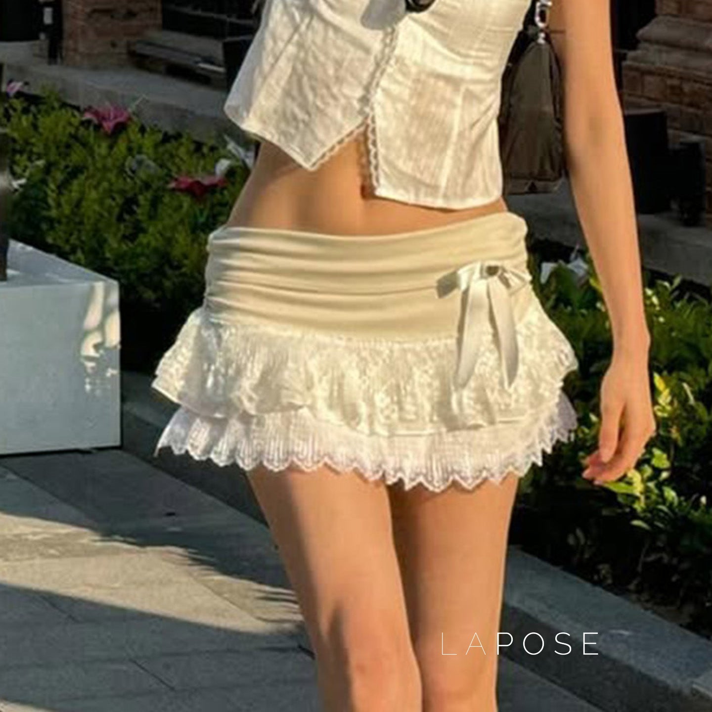 Leylani Bow Tiered Mini Skirt