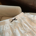 Reagen Tiered Bow Mini Skirt [5EAURNBS]
