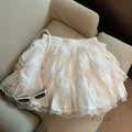 Reagen Tiered Bow Mini Skirt [N77LW5OB]