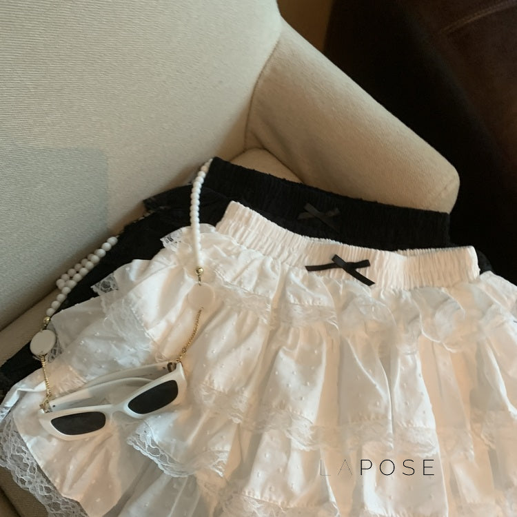 Reagen Tiered Bow Mini Skirt [0OLNH86F]