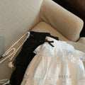 Reagen Tiered Bow Mini Skirt [Q9PT841Z]